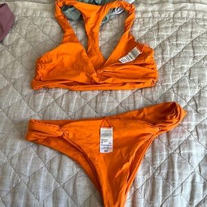 Xs too small bottoms orange l space suit